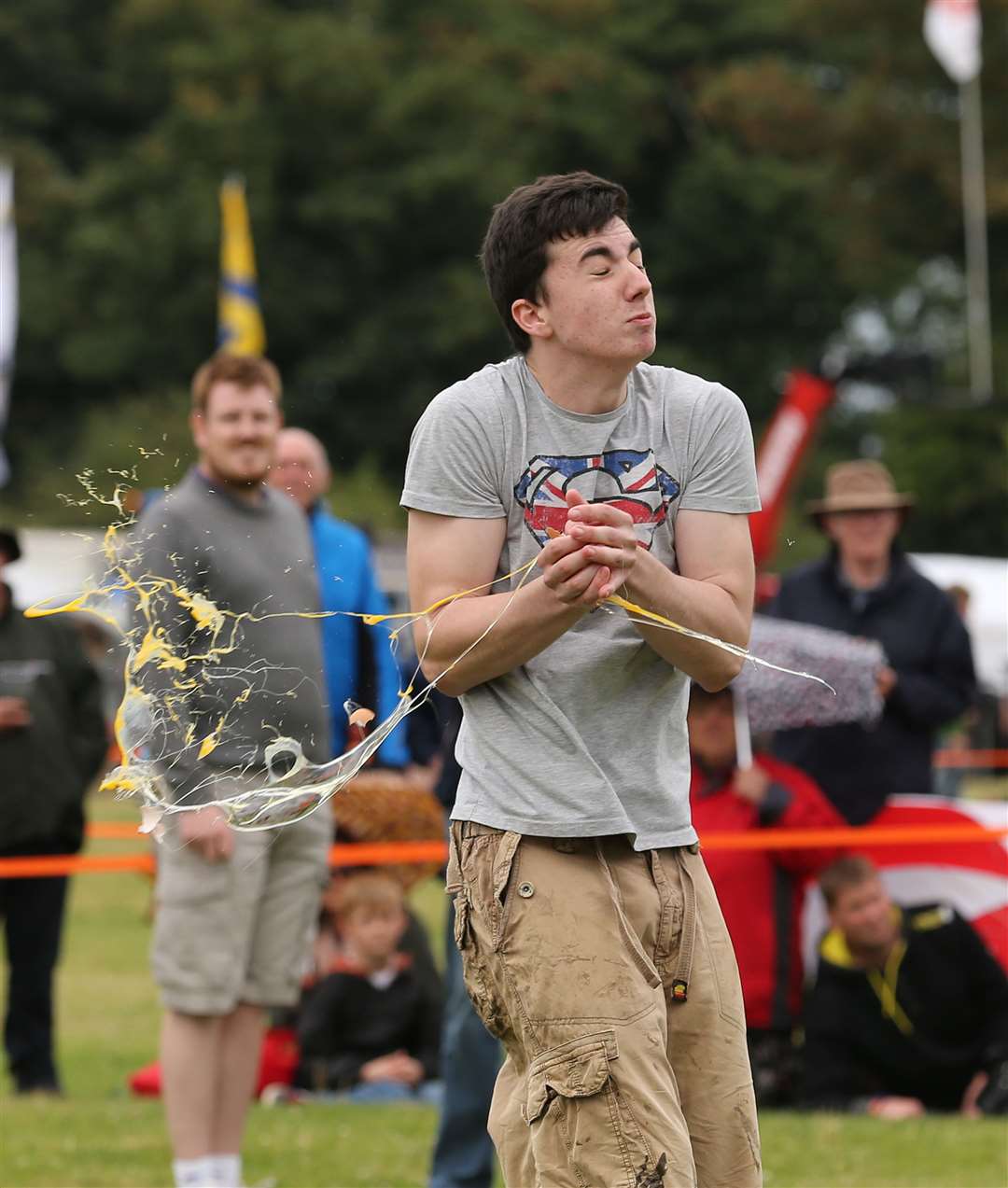 Competitors take part in the 45-metre catch discipline during the World Egg Throwing Championships at the Swaton Vintage Day fayre near Swaton in Lincolnshire (PA)