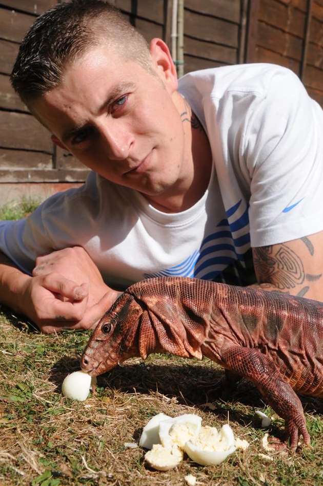 Jake Shepherd with his pet red tegu Rex in Faversham