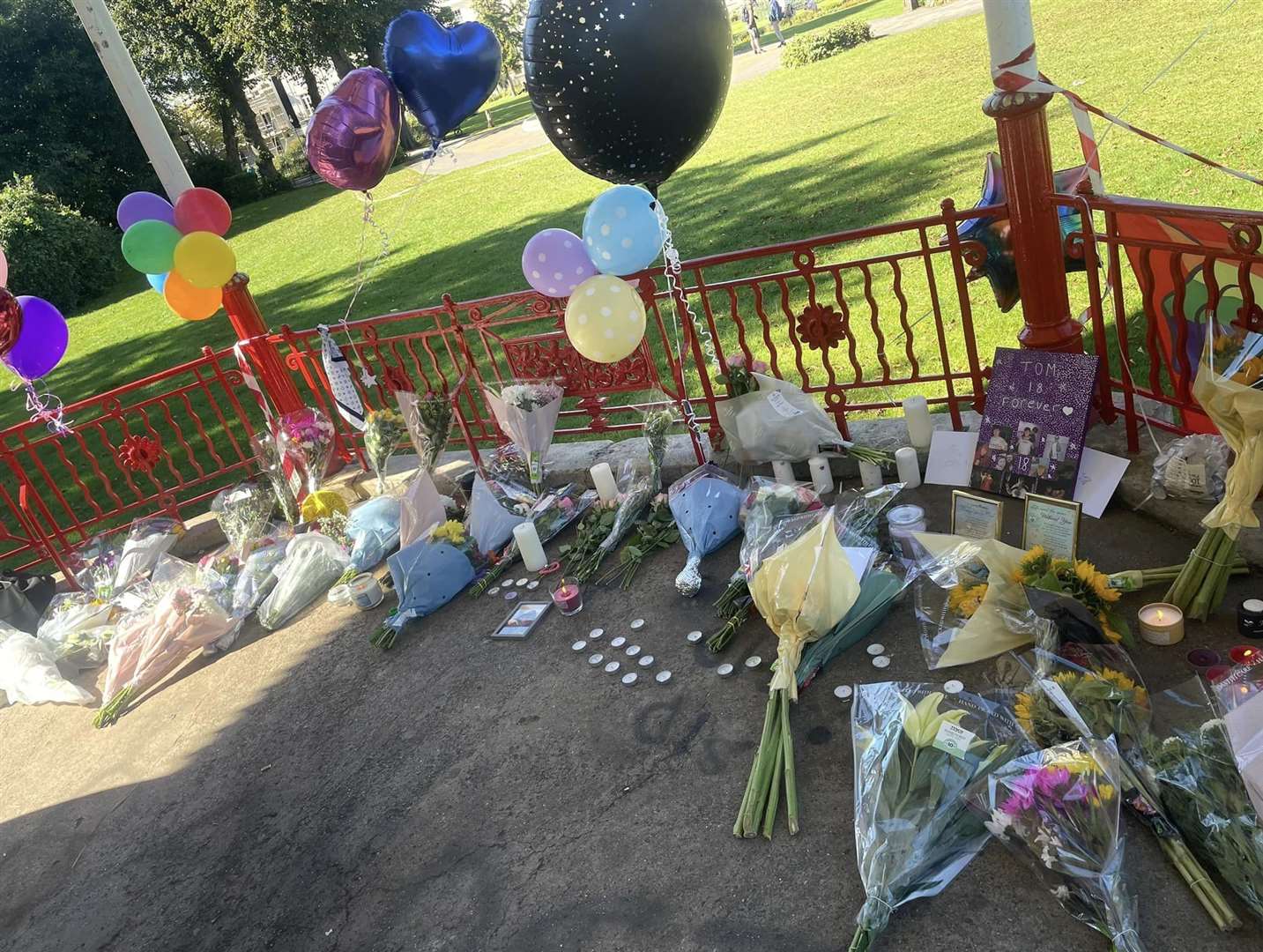 Flowers, candles and cards were left during the vigil to Tom Watson