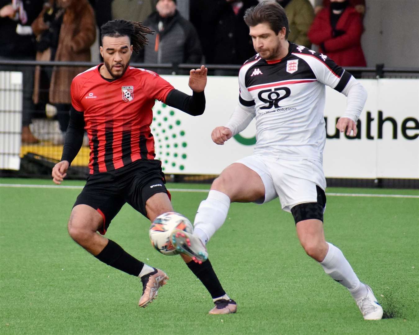 Matt Newman puts a foot in for Faversham in Saturday’s 2-0 loss to frontrunners Glebe. Picture: Randolph File