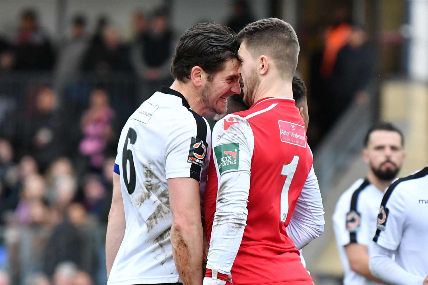 Dartford captain Tom Bonner clashes with goalkeeper Bailey Vose Picture: Keith Gillard