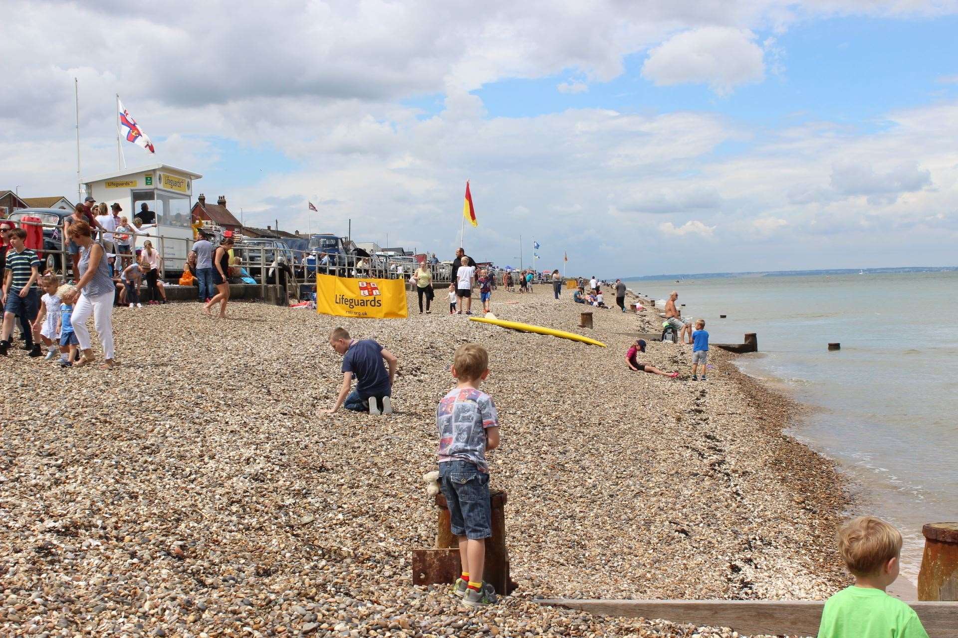 RNLI lifeguards patrolling Minster beach at The Leas on the Isle of Sheppey