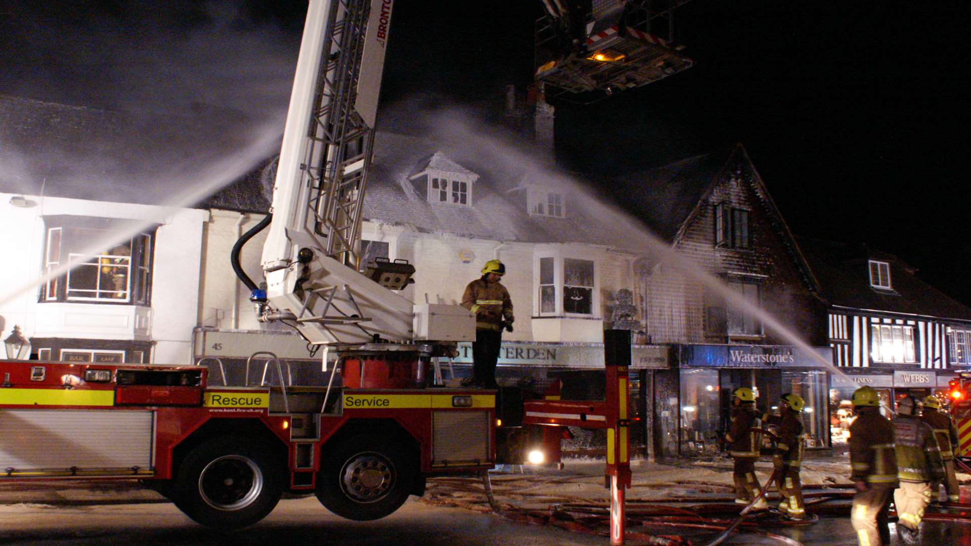 The fire is tackled from all angles. Picture: Malcolm Dickson