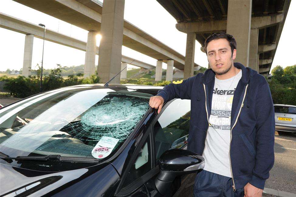 Alex's windscreen was smashed and there was a dent in the roof