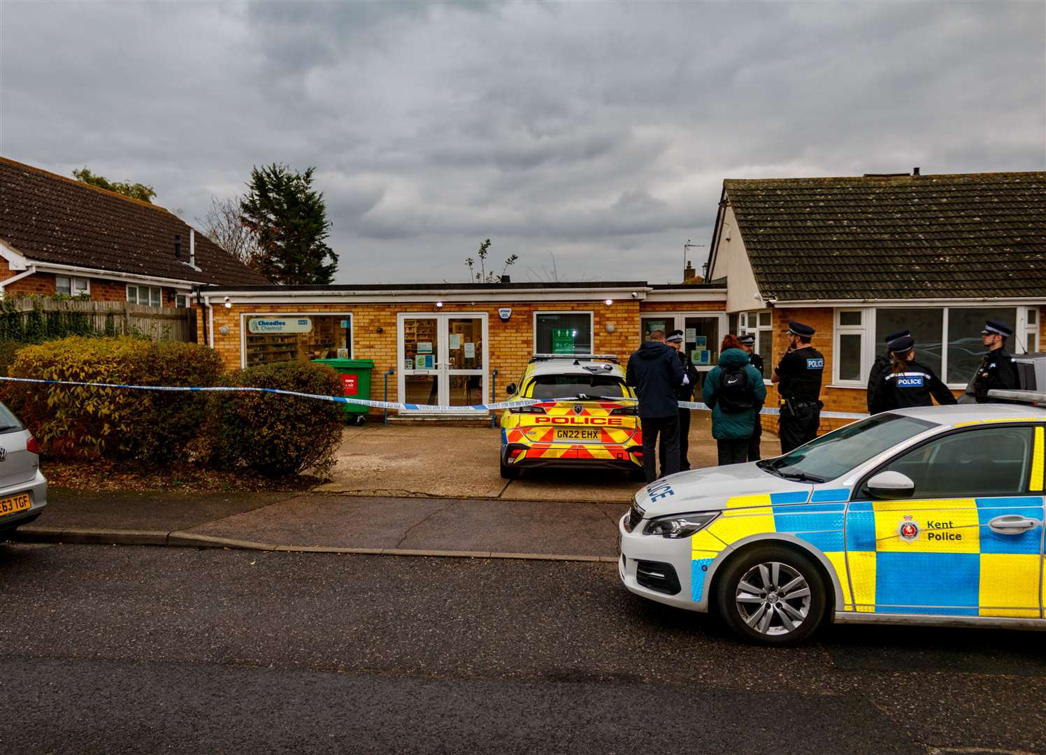 Police at the scene of a suspected robbery at Cheadles Chemist in Seasalter, near Whitstable. Picture: Les Hawkins