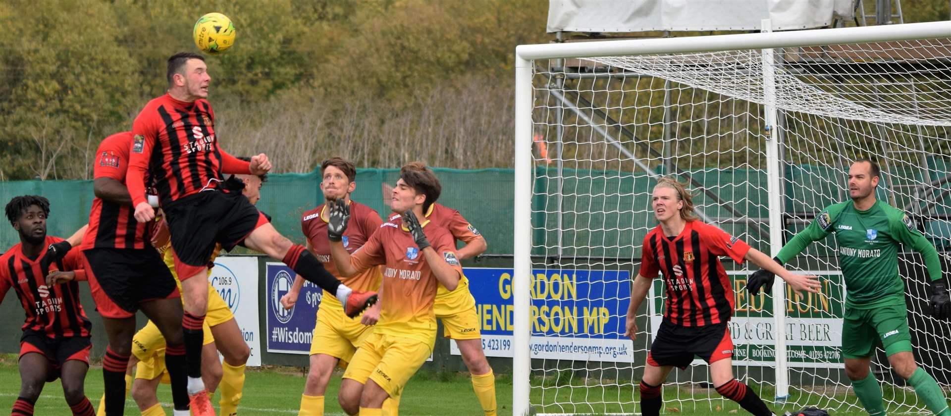 Joe Denny wins a header in the box for Sittingbourne. Picture: Ken Medwyn