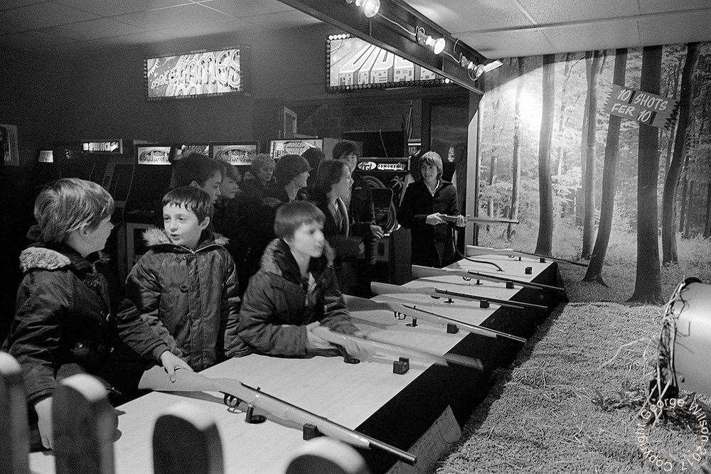 These young lads tried their luck at the shooting range. Copyright: George Wilson