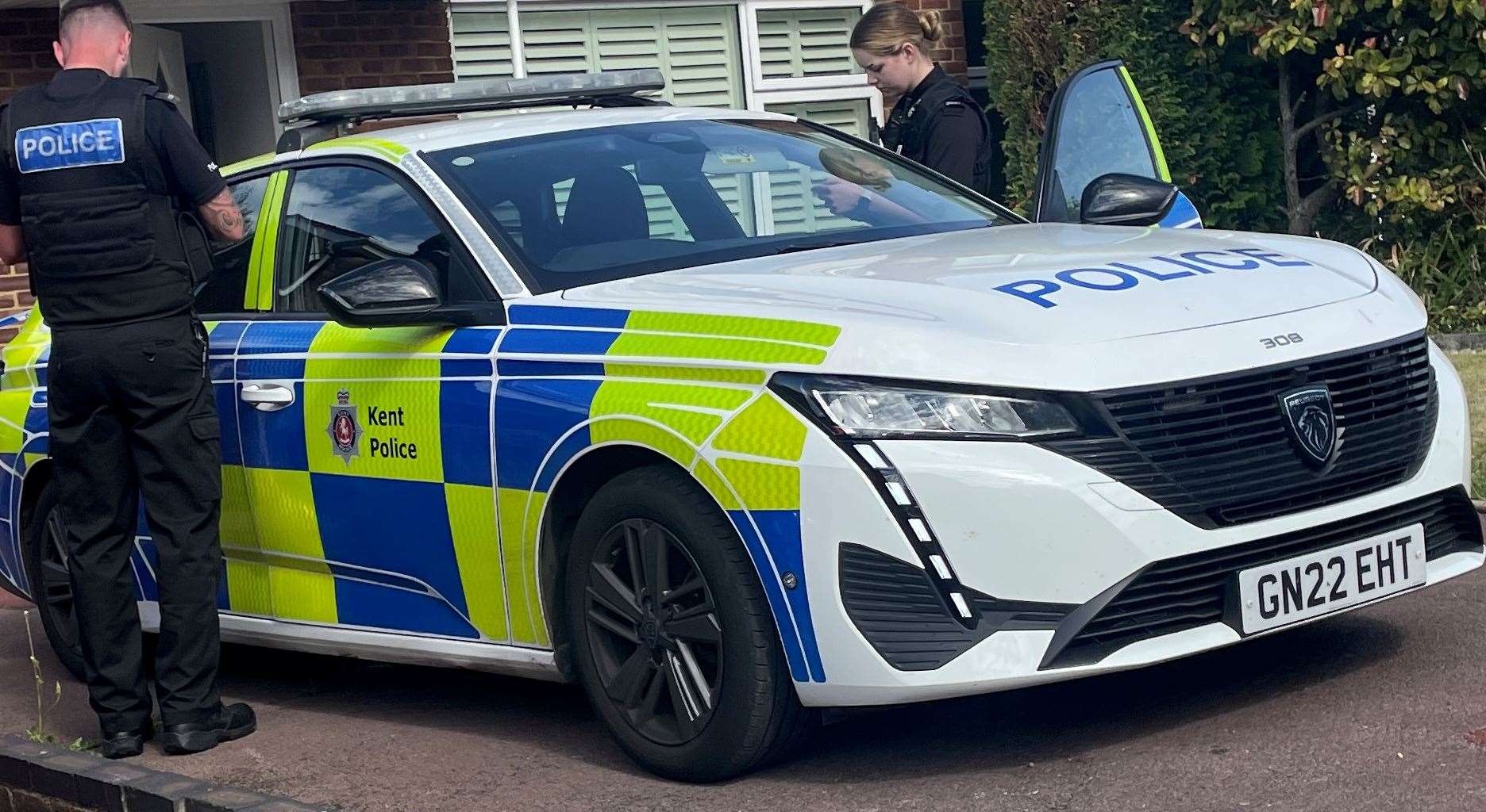 Police at a property in The Poles, Upchurch, after the street was cordoned off by emergency teams