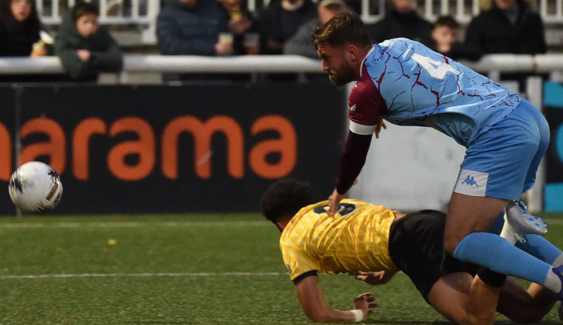 Maidstone win an early penalty as Sol Wanjau-Smith is fouled by Corey Panter. Picture: Steve Terrell