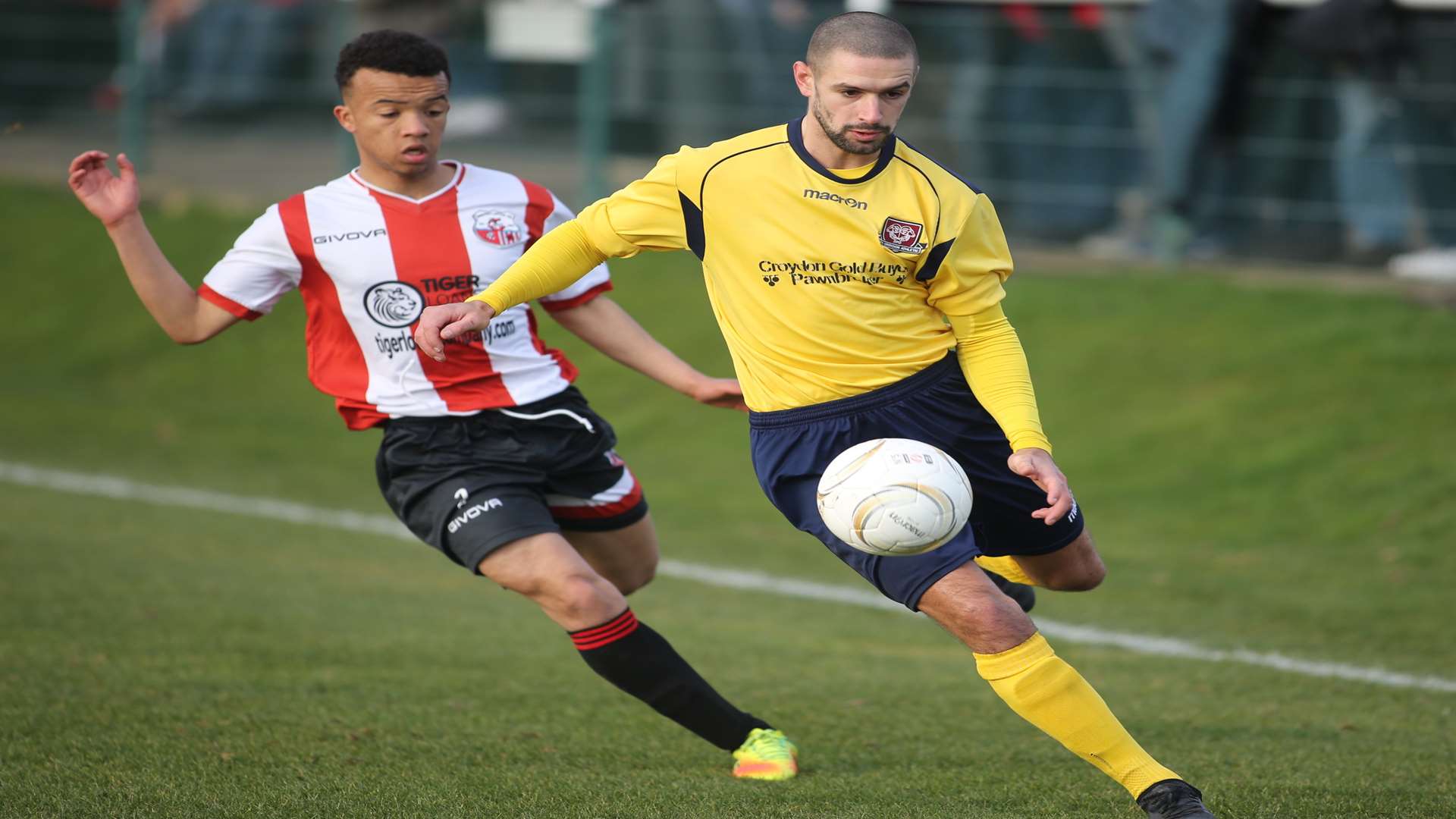 Sheppey (red) take on AFC Croydon in the Southern Counties East League last season - the pair will meet in the FA Cup on August 5. Picture: John Westhrop