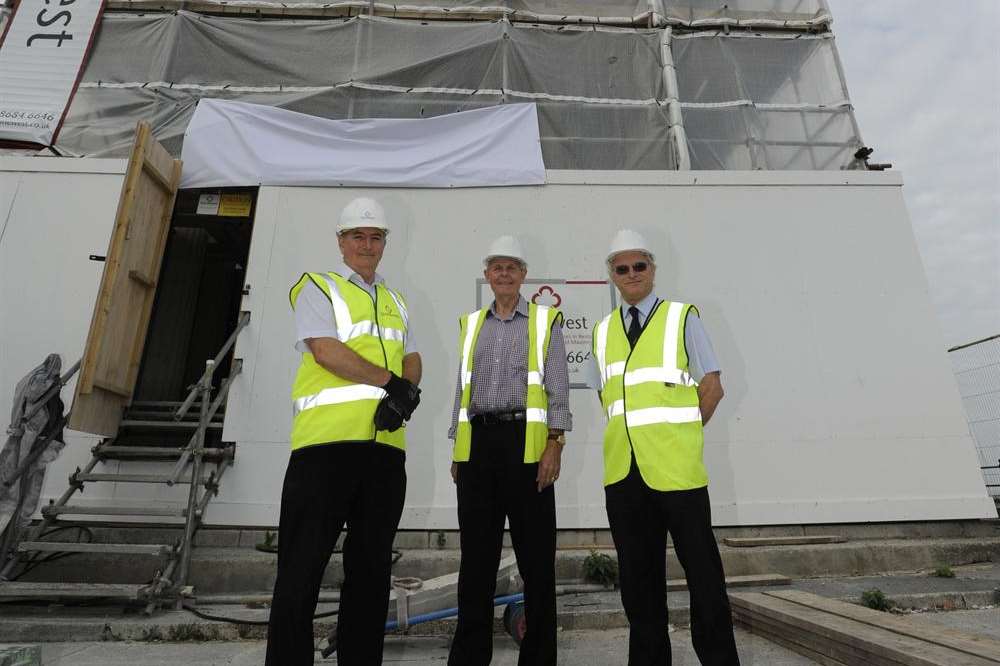 Peter O'Sullivan on the left with city council officer Colin Pengelly in the centre, and engineer Philip Kiss on the right