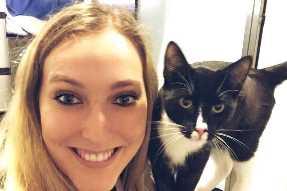 Denise posing with charity worker Olivia Lazarus. Picture: Battersea Dogs and Cats Home