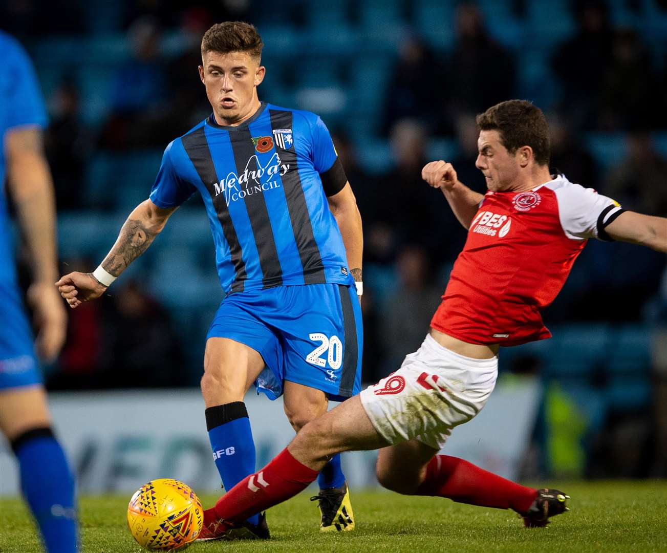 Gillingham's Darren Oldaker takes on Fleetwood's Nathan Sheron Picture: Ady Kerry