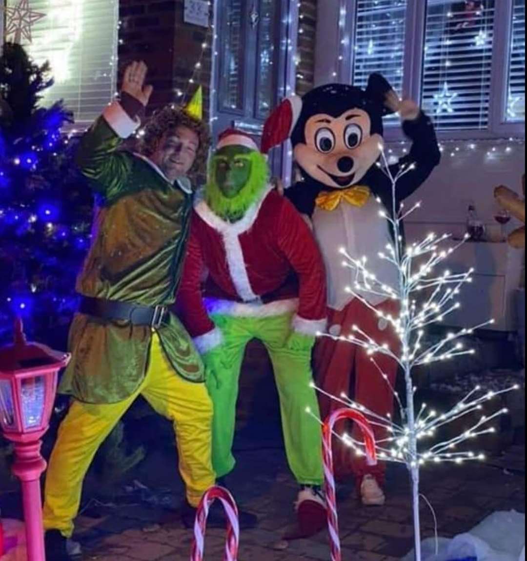 Jodie Humpreys, Andy Lots and Anthony Malyon dressed up outside their festive fundraiser in Beech Road, Strood, which is raising money for Medway Maritime's children's ward