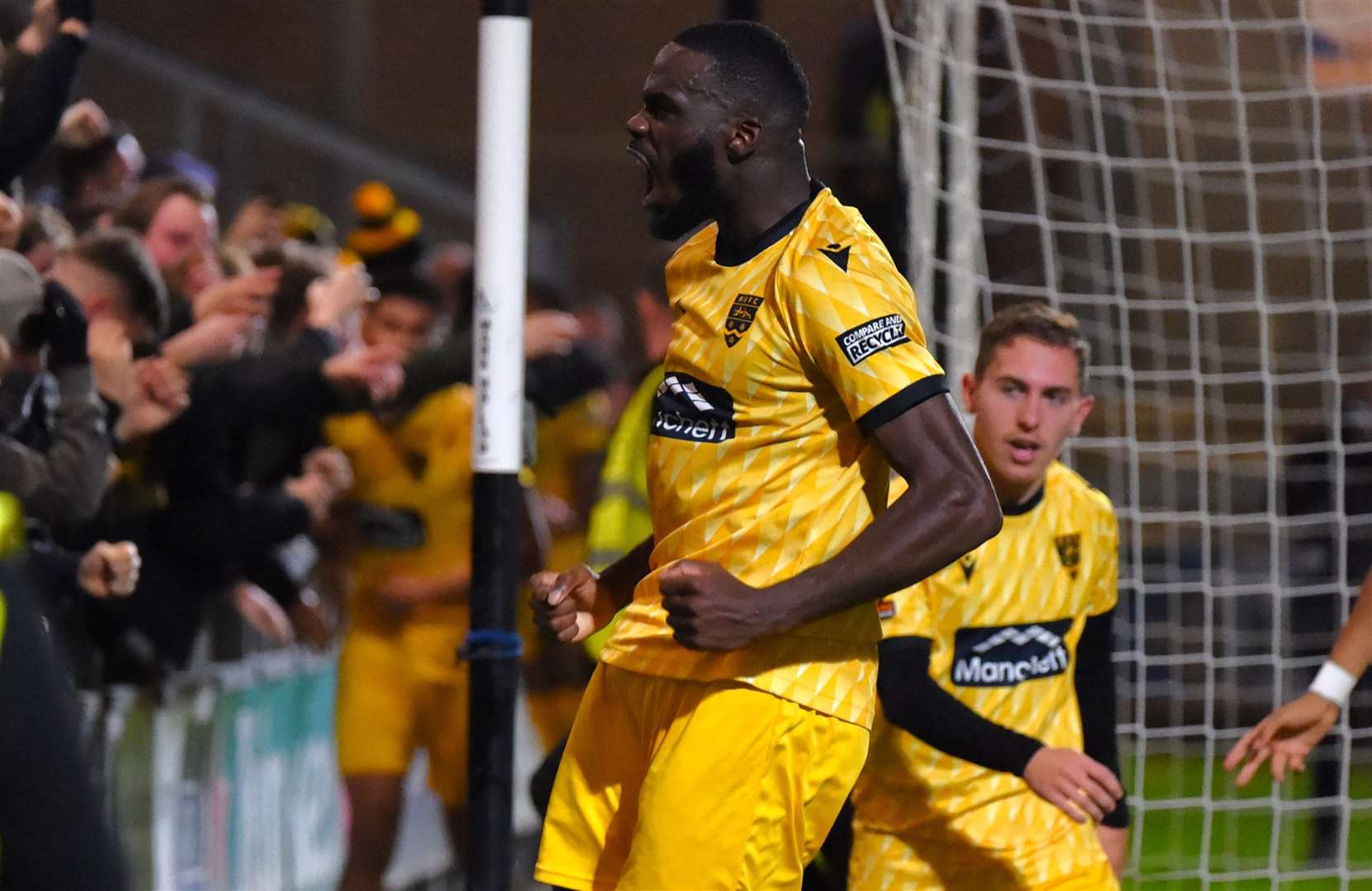 Levi Amantchi celebrates his 94th-minute winner. Picture: Steve Terrell