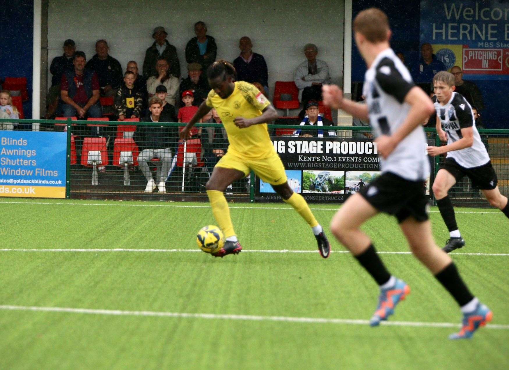 Bola Dawodu runs through the midfield for Herne Bay in their weekend 2-0 friendly loss at home to a Gillingham XI. Picture: James Aylward