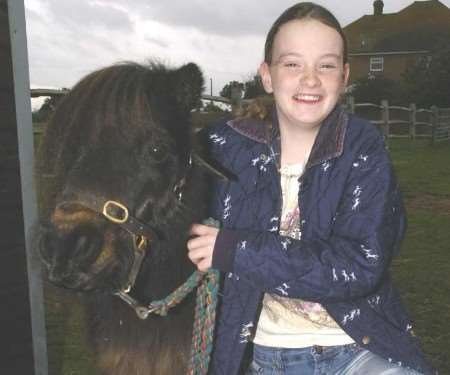 Marley with his owner Coral Davis. Picture: NICK JOHNSON