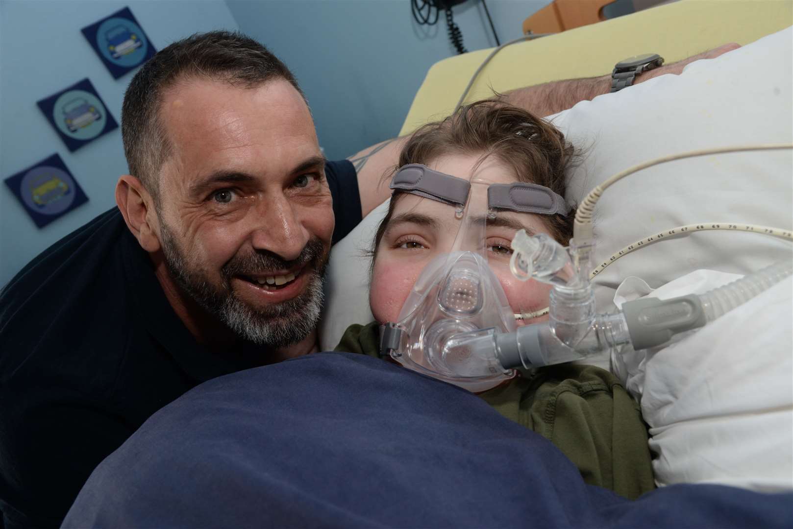 Adrian Rafferty and his son Jacob, 15 at Demelza House in Bobbing. Picture: Chris Davey... (7641187)