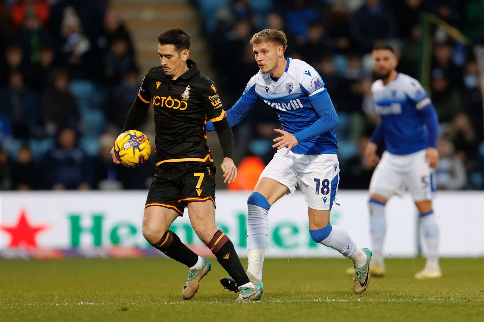 Ethan Coleman in the thick of it for Gillingham Picture: Beau Goodwin