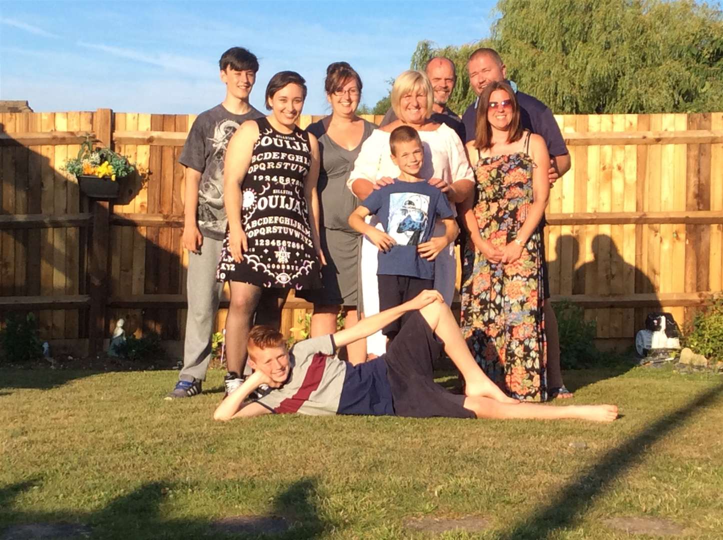 Daughter Pat, centre, with her children - Eddie's grandchildren - in laws and Eddie's four great grandchildren