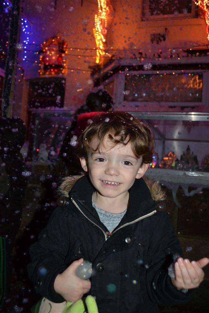 Zacoiya Brewster, three, who flicked the switch at the big light switch on at the home of his neighbour Rick Marsh in Byron Avenue, Margate. Picture: Pete Brewster