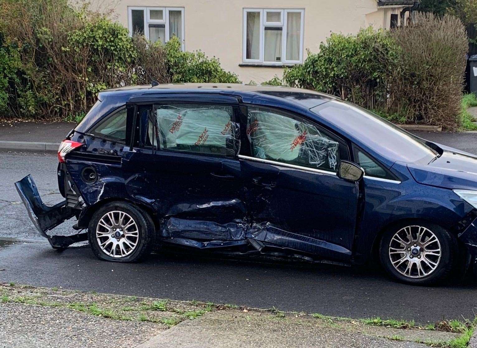 Michael Lee's car after the Fire Service had helped haul it back onto the road