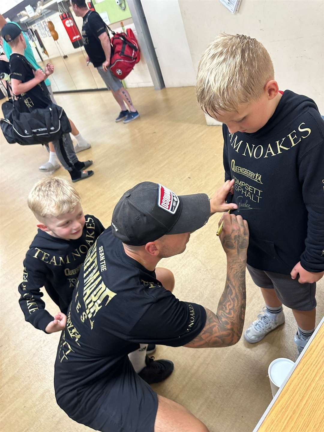 Maidstone boxer Sean Noakes signs autographs on his return to former amateur club Westree.