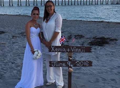 Xenia and Vinnii on their wedding day at Venice beach.