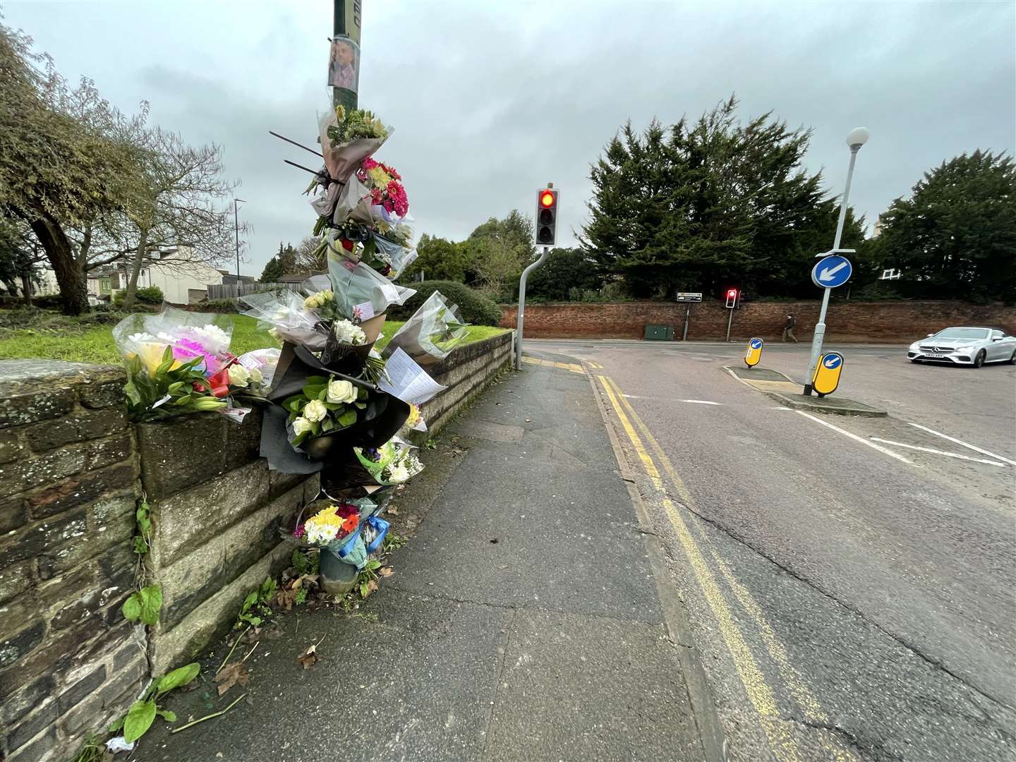 Floral tributes have been left in Station Road, Strood, for father-of-three Andy Millward. Picture: Sean McPolin