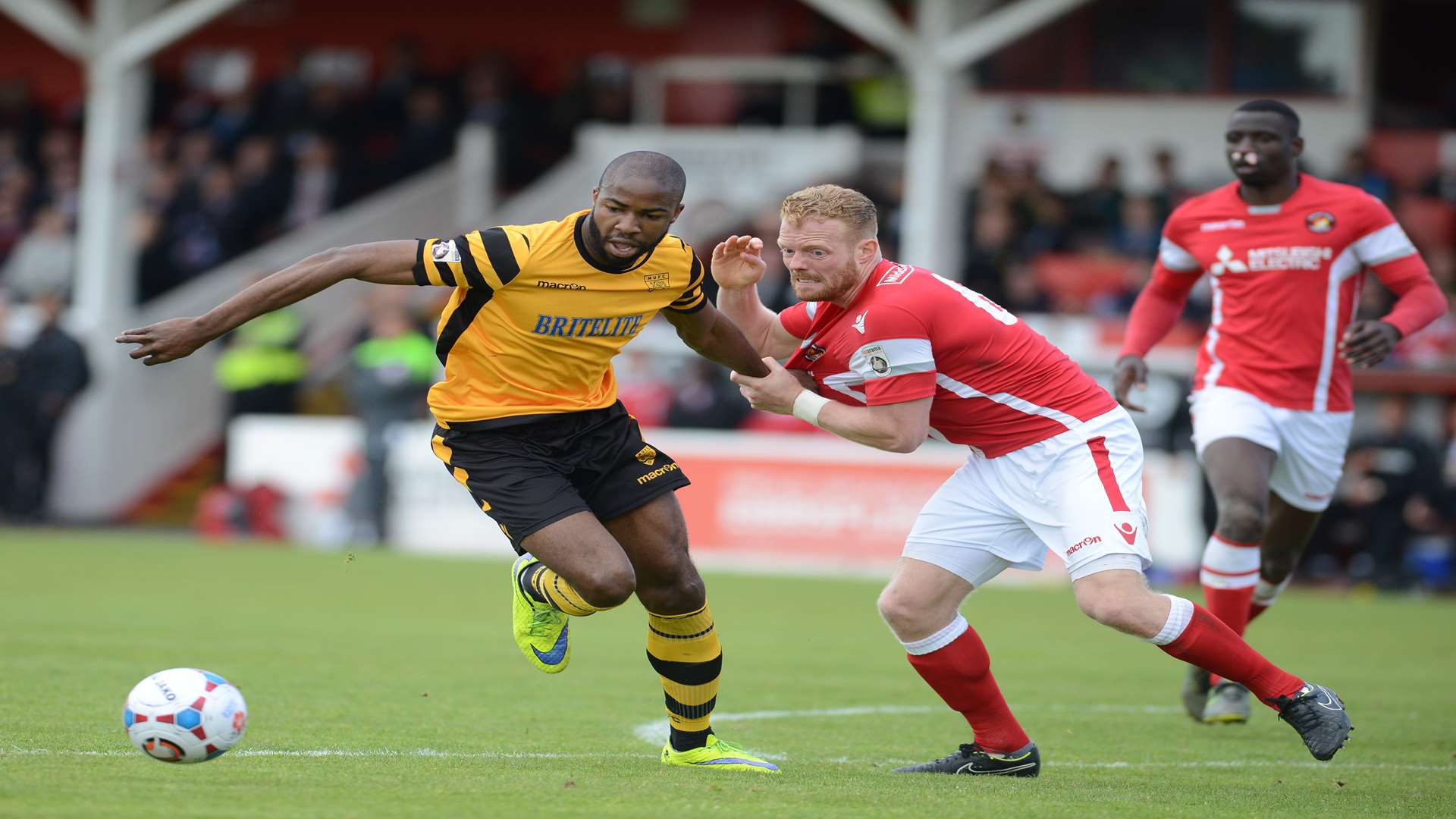 Kenny Clark grapples with Dumebi Dumaka during last season's play-off final Picture: Gary Browne