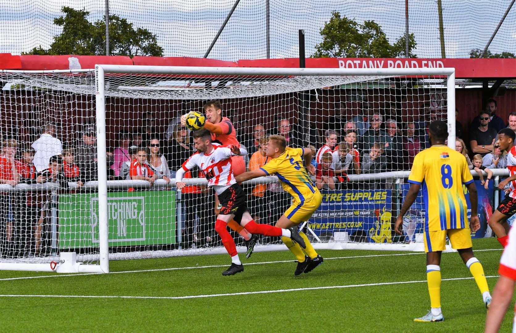 Sittingbourne goalkeeper Bobby Mason gathers the loose ball ahead of Dan Bradshaw Picture: Marc Richards