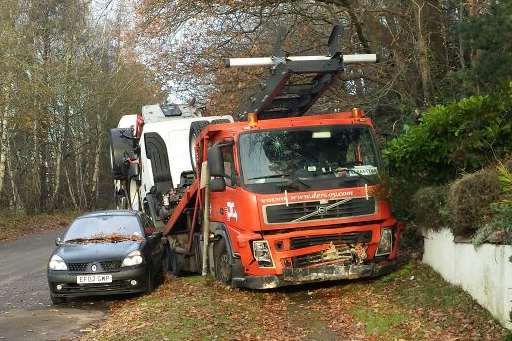 The transporter hit a car and a wall