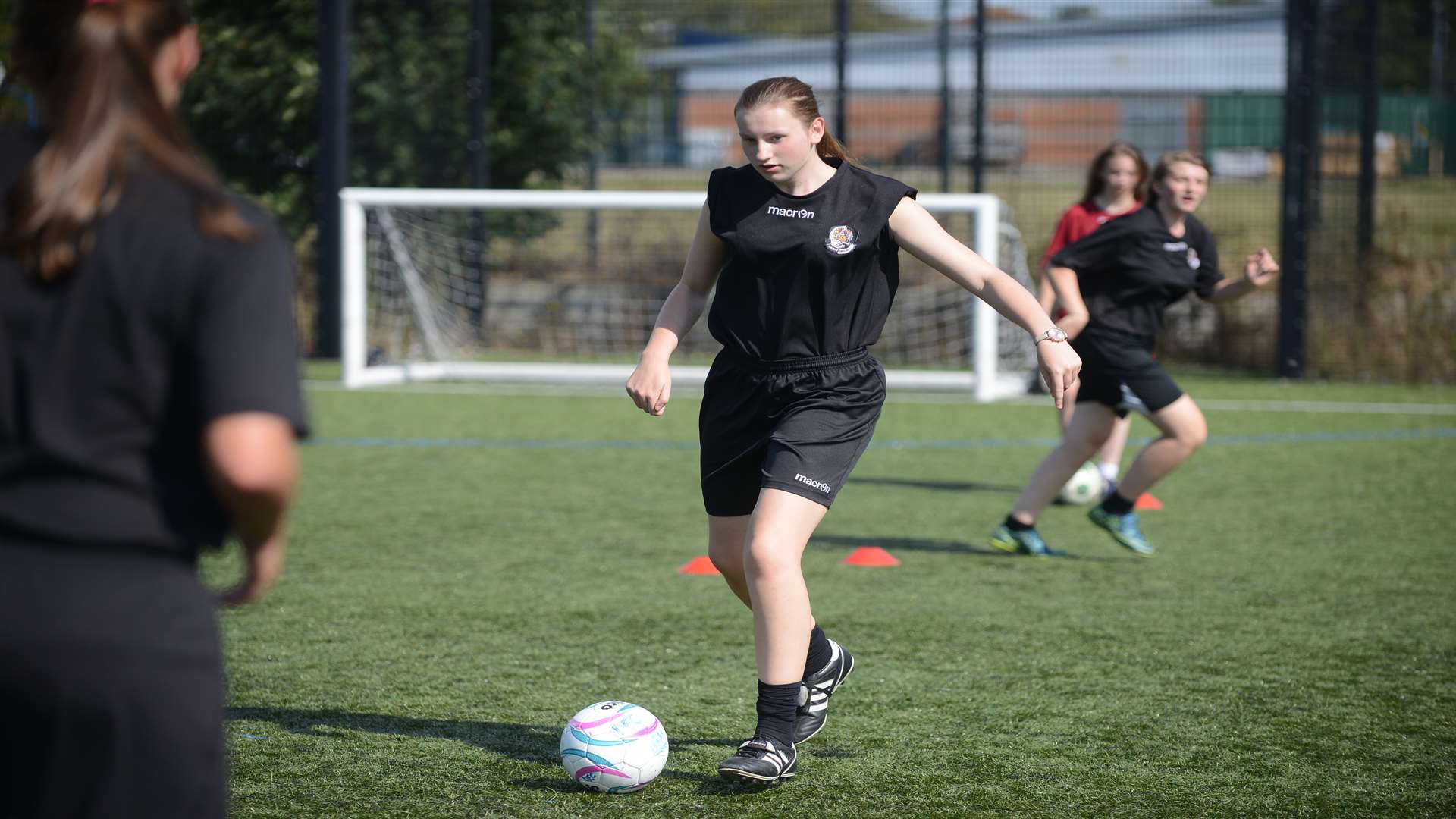 Masie Challis Senior Girls Football team from Leigh Academy training at Dartford FC stadium