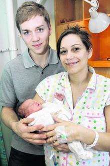 Christmas Day baby Marie Katie Brearey with her mum Laura and dad Nicci