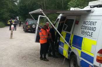 Incident command unit in the car park of the woods