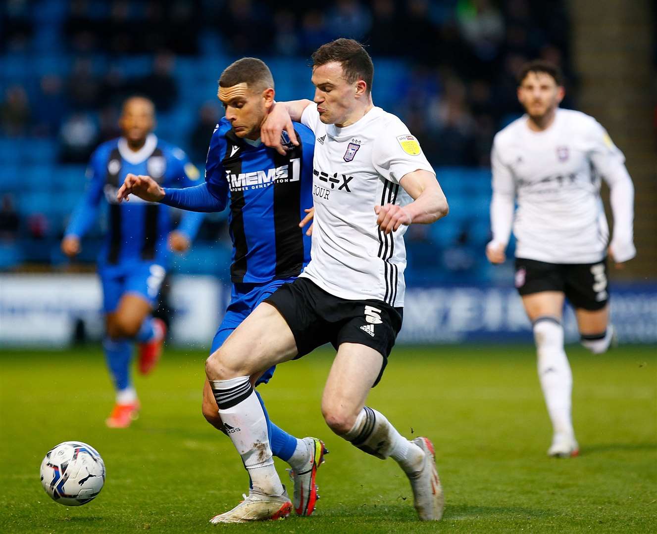 Stuart O'Keefe takes on Ipswich defender George Edmundson. Picture: Andy Jones