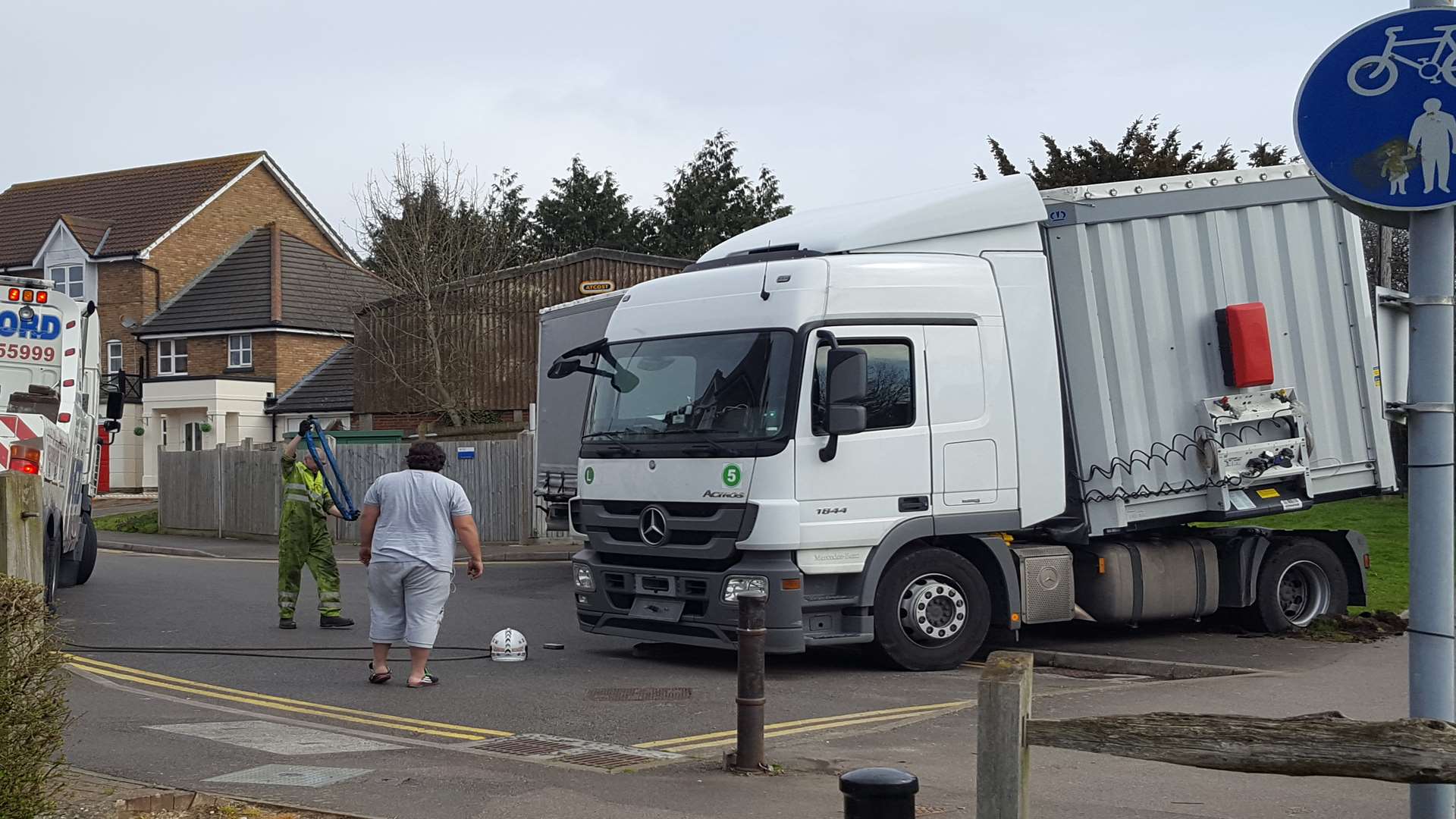 Recovery workers are trying to remove the lorry