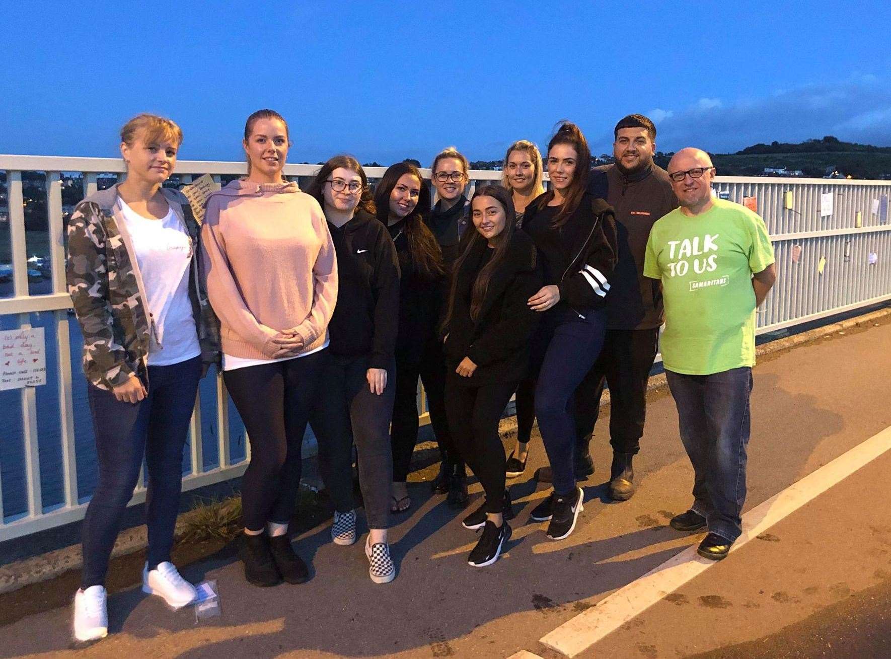 The group from Cuxton are giving up their evenings to put positive messages on the bridge