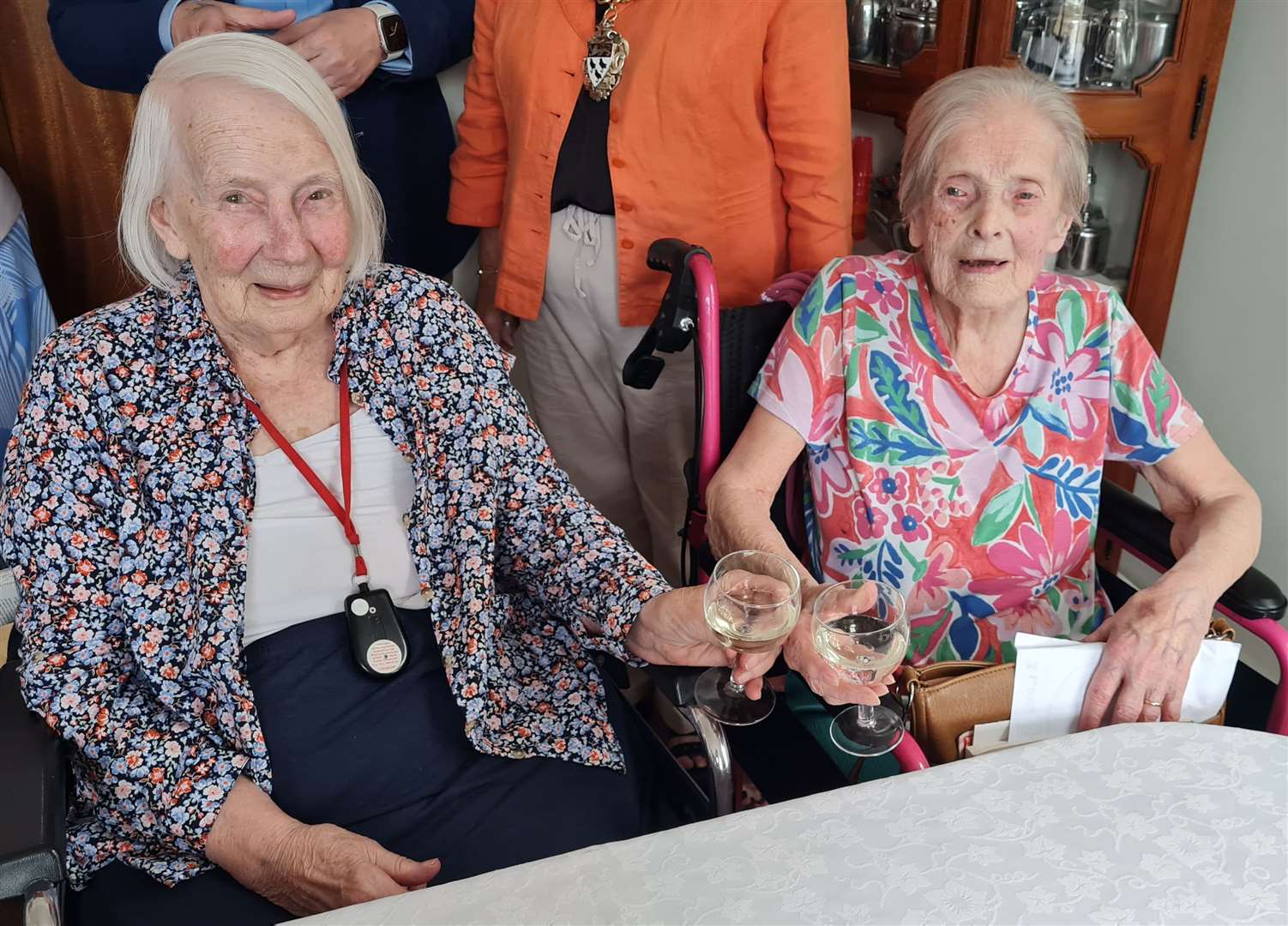 Pauline Ventress, 99, and Margaret Lewis, 102, enjoy a glass of bubbly at Red House Nursing Home in Canterbury