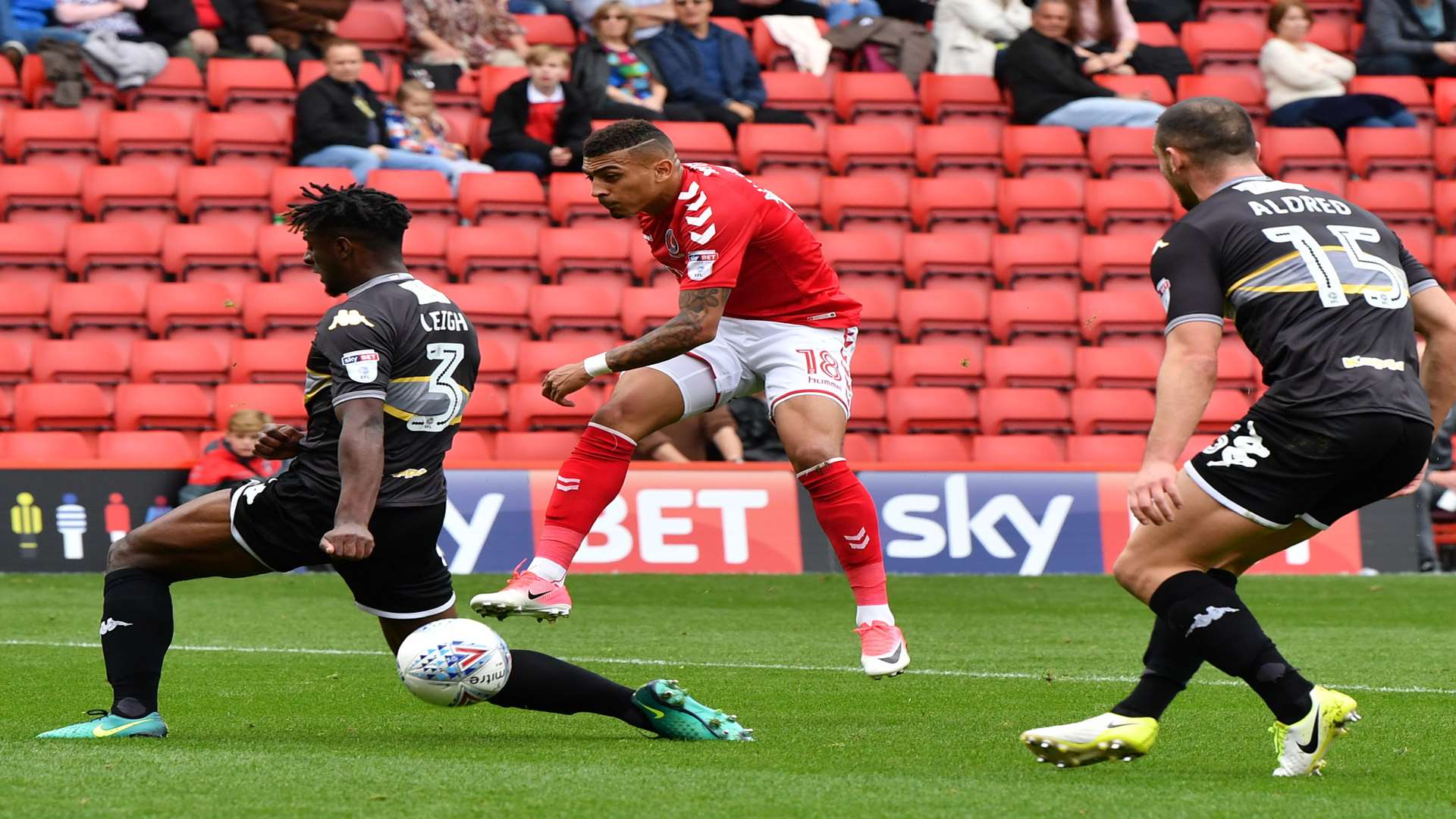 Karlan Ahearne-Grant's shot is blocked against Bury. Picture: Keith Gillard