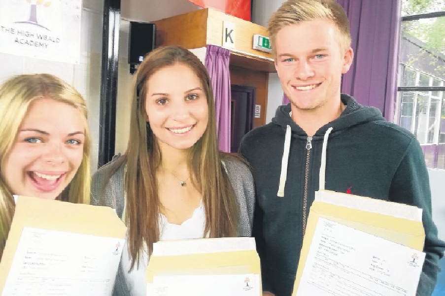 Smiling for the KM photographer at the High Weald Academy in 2014. Daniella Gray is pictured in the middle.