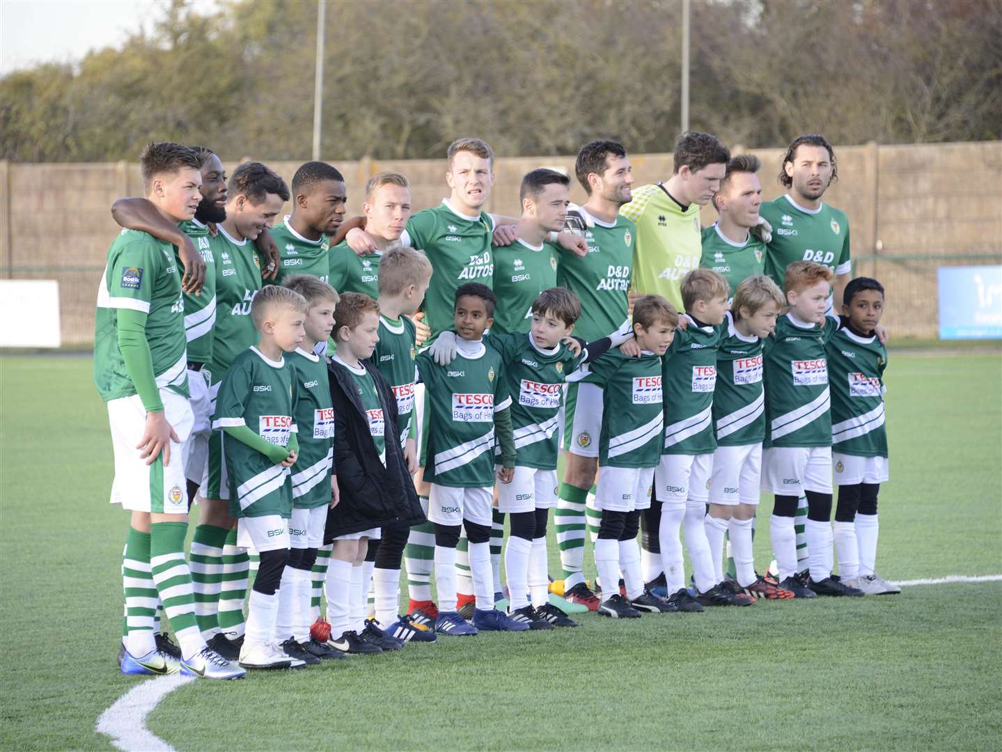 Ashford's players observe a minute's silence before their game against Horsham Picture: Paul Amos