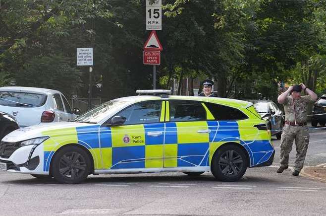 Officers at the scene in Sally Port Gardens in Gillingham. Picture: Gareth Fuller/PA