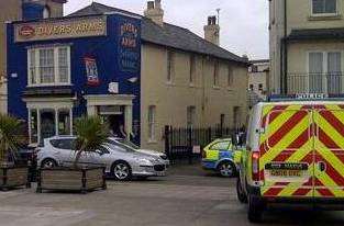 Police vehicles near the Divers Arms