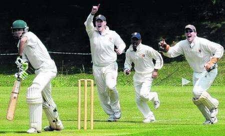 Sandwich celebrate as Canterbury opener Luke Samarasinghe is caught behind