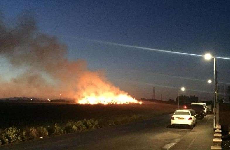 Fire crews have urged those living nearby to shut windows and doors. Picture: Amanda Jayne Priddle