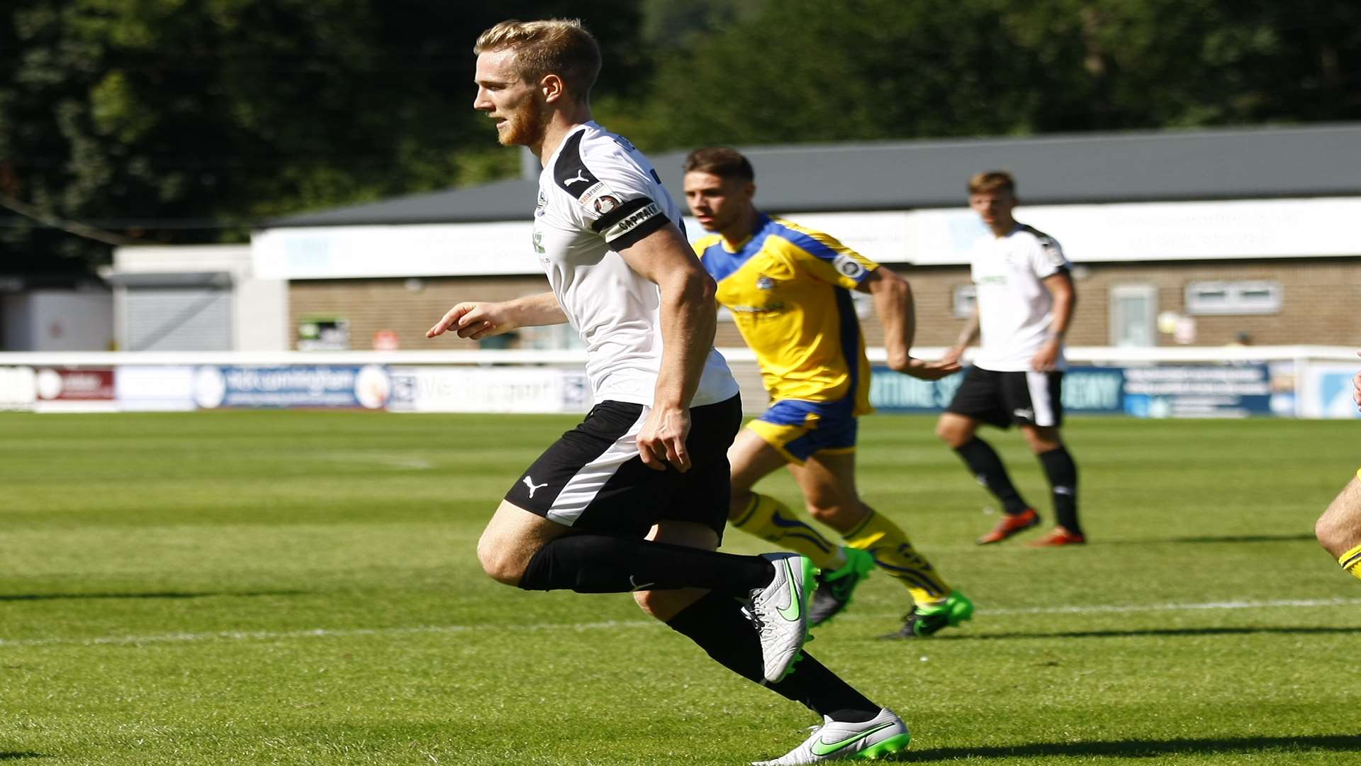 Dover captain Jamie Grimes in hot pursuit of the ball against Altrincham at Crabble on Saturday Picture: Matt Bristow