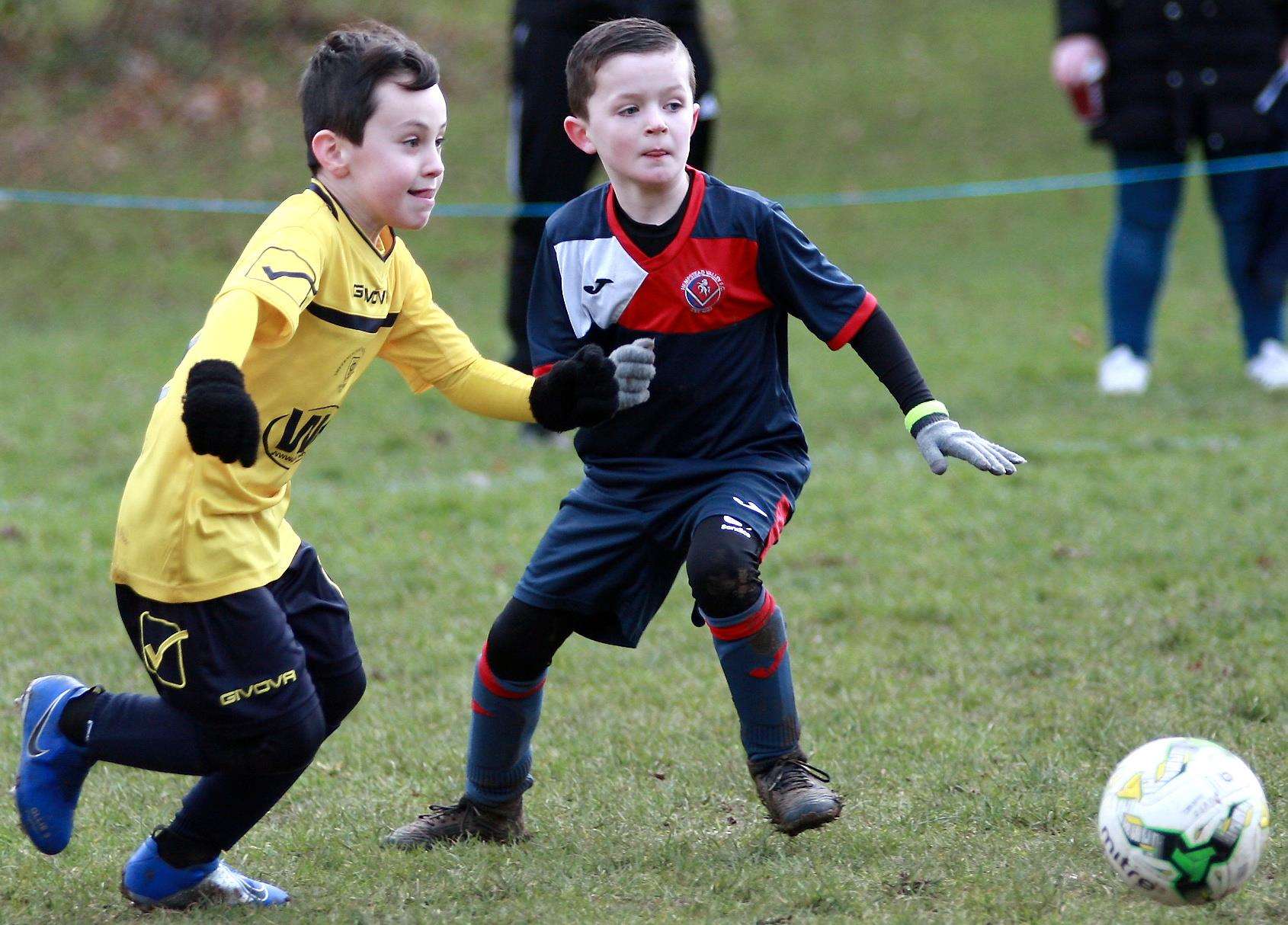 Hempstead Valley Harriers under-8s (blue) met Sheerness East Dynamos under-8s. Picture: Phil Lee FM6792375