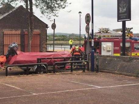 Emergency services at the slipway by the Command House pub in Chatham