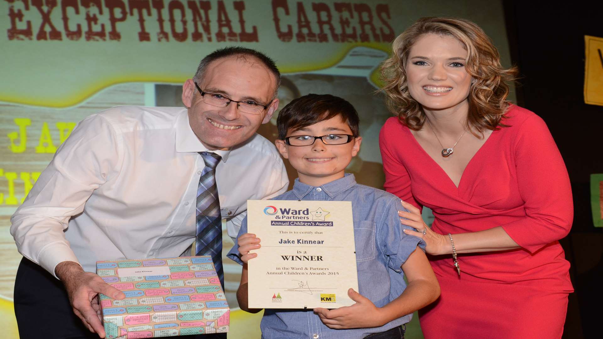 Charlotte Hawkins and Jason Bunning, lettings director for Arun Estates, presenting award to Jake Kinnear